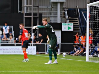 Josh Keeley gives directions to his defenders
