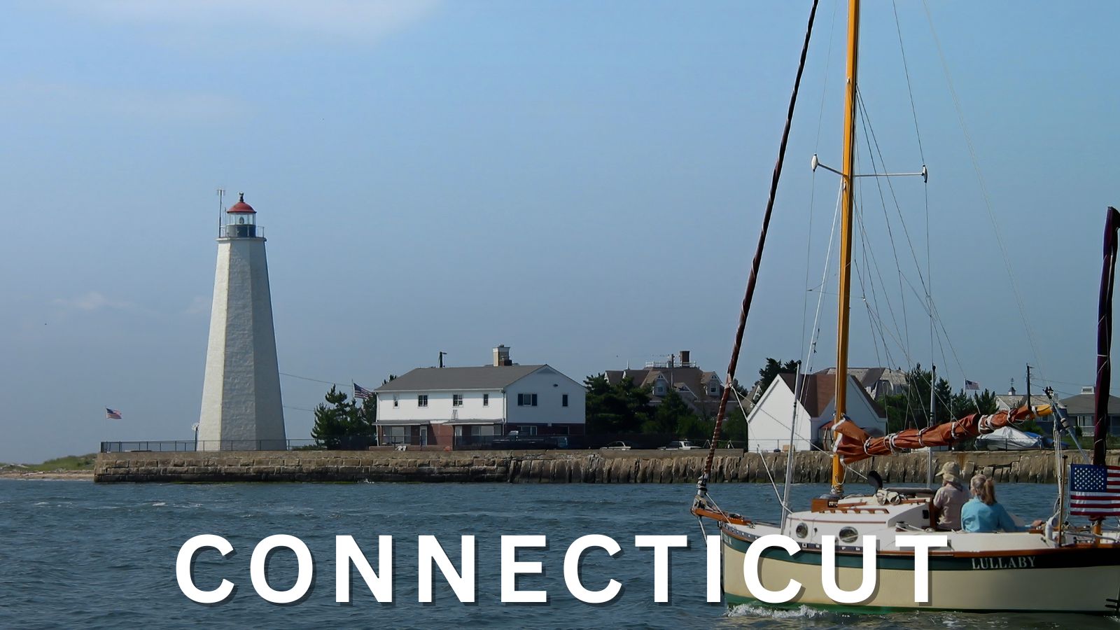 Connecticut coastline lighthouse and sailboat representing coastal towns and shoreline views