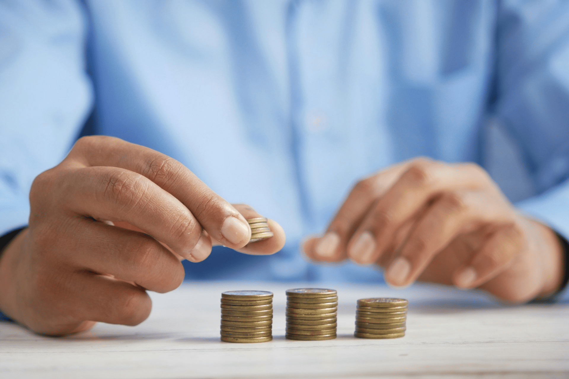 Budgeting Tips, Hands counting coins
