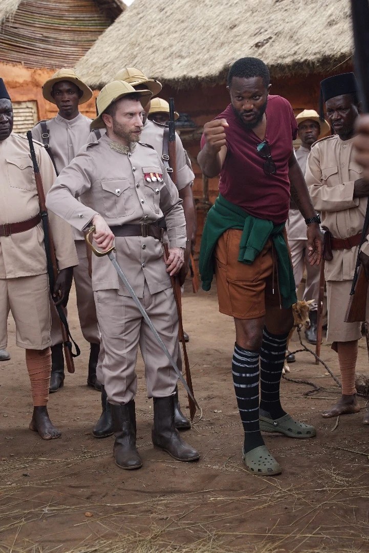 Behind-the-scenes still of director James Omokwe on the set of Osamede