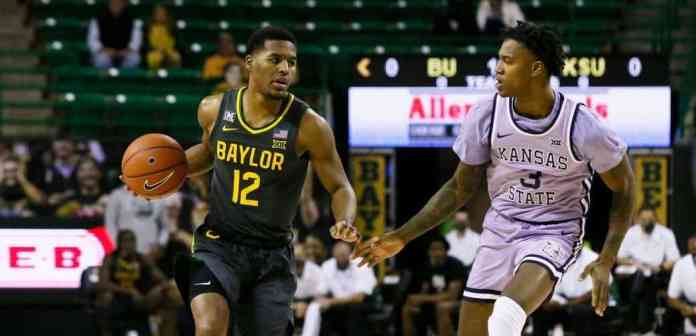 Baylor 2 (2) A Baylor basketball player dribbling down the court.