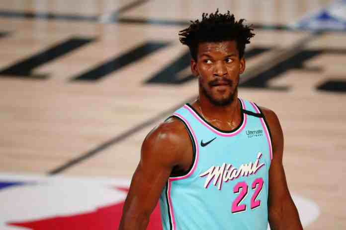 Indiana Pacers v Miami Heat LAKE BUENA VISTA, FLORIDA - AUGUST 10: Jimmy Butler #22 of the Miami Heat looks on during the first half against the Indiana Pacers at Visa Athletic Center at ESPN Wide World Of Sports Complex on August 10, 2020 in Lake Buena Vista, Florida. NOTE TO USER: User expressly acknowledges and agrees that, by downloading and or using this photograph, User is consenting to the terms and conditions of the Getty Images License Agreement. (Photo by Kim Klement - Pool/Getty Images)