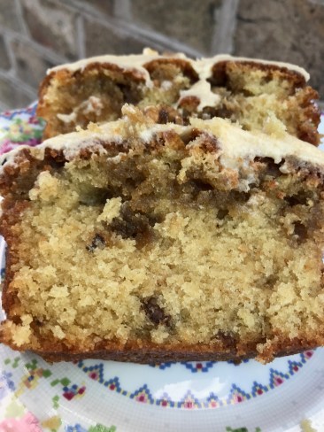 Slice of coffee and walnut drizzle cake