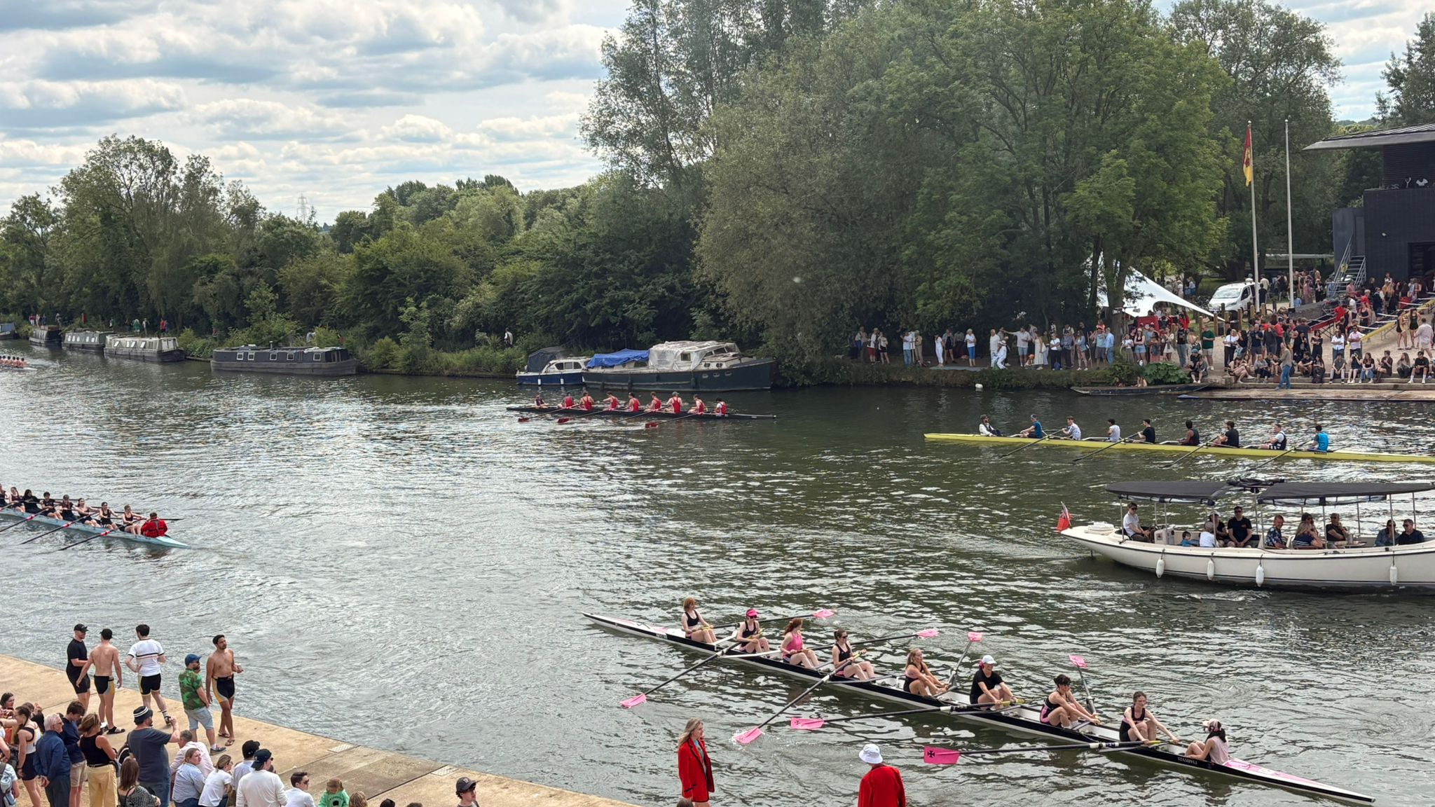 boats rowing on river