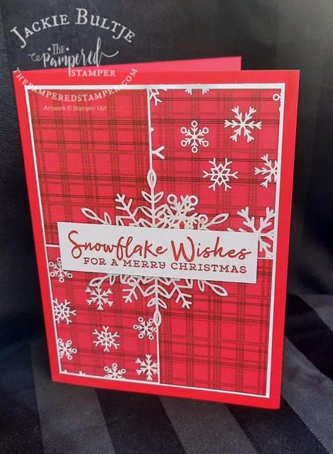 Red card with Snowflake Wishes sentiment and Peaceful Prints paper.