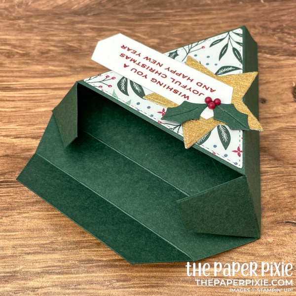 This is a tapered triangle gift box made with the Tidings of Christmas Stampin' Up! suite and the sentiment says Wishing You a Joyful Christmas and Happy New Year