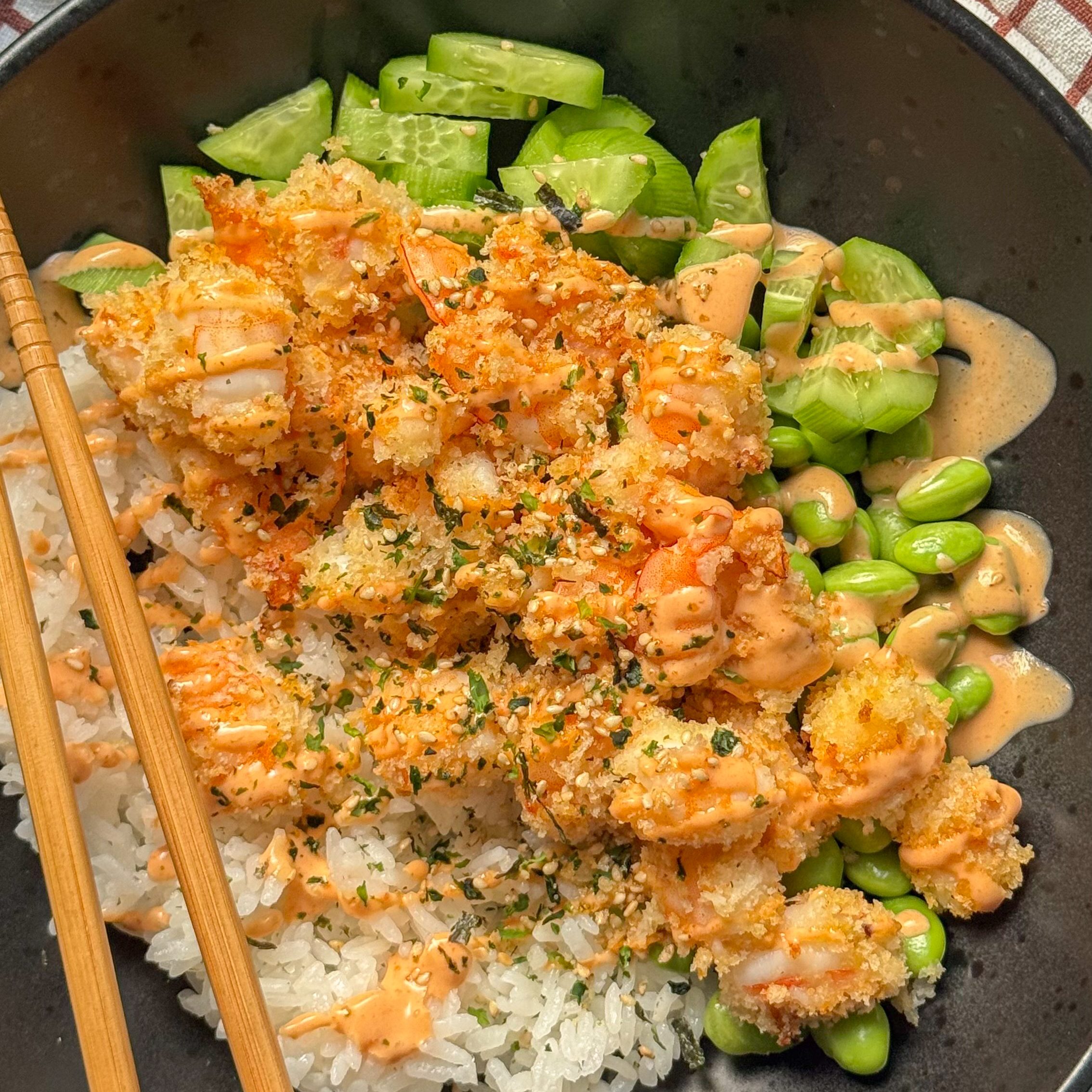 Air Fryer Panko Crusted Shrimp Rice Bowl with crispy shrimp, rice, fresh cucumber, and edamame.