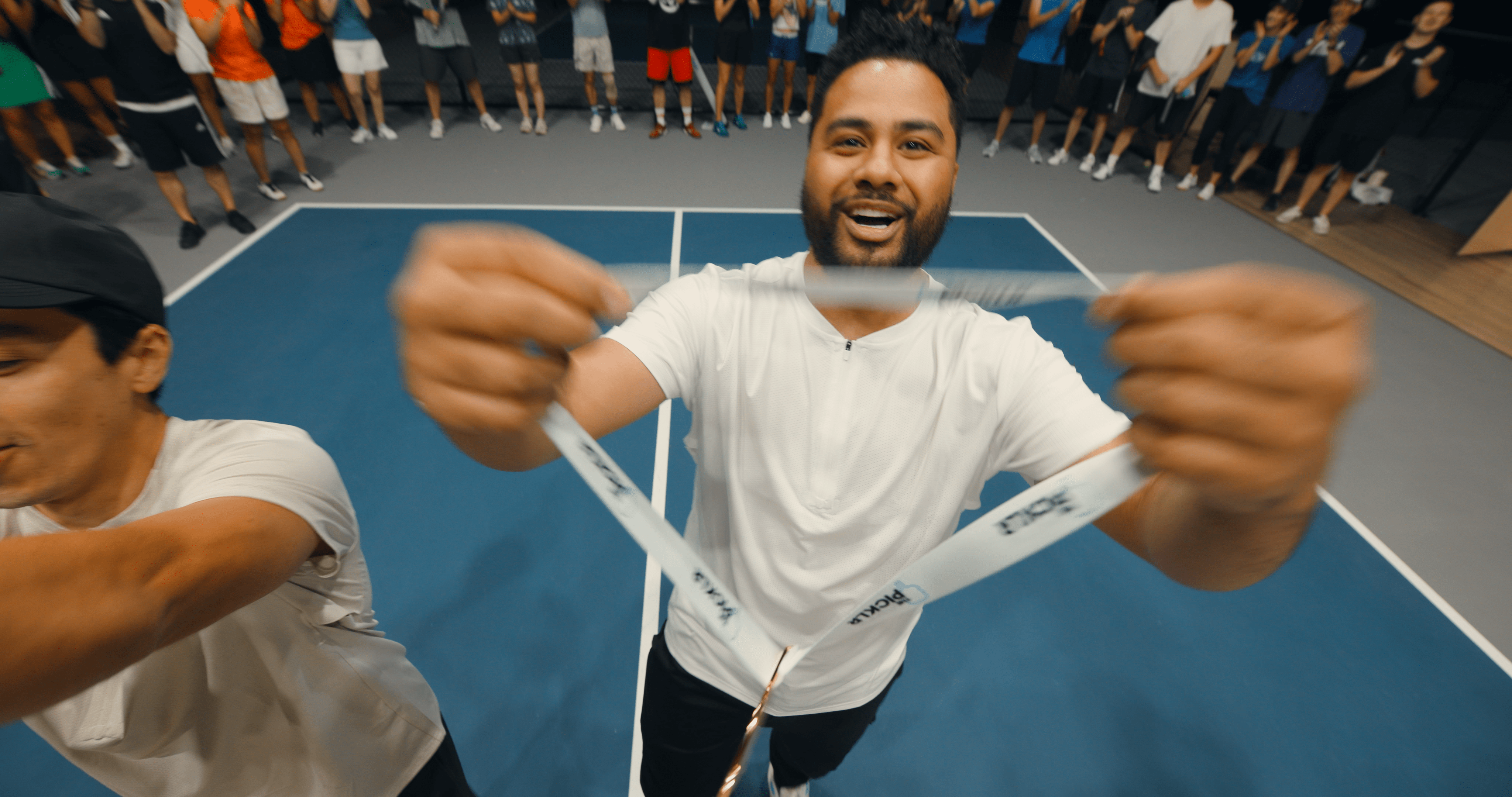 Pickleball professional receiving a medal after winning a tournament