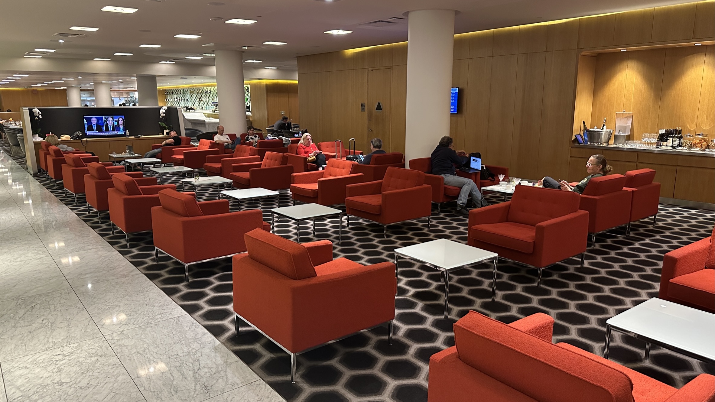 Red chairs at the Qantas First Class Lounge LAX
