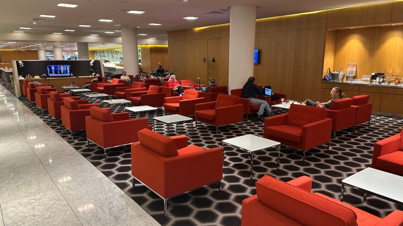 Red chairs at the Qantas First Class Lounge LAX
