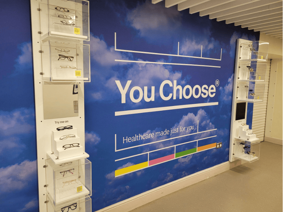 A blue wall with the words 'You Choose' written and underlined in white to imitate a pharmaceutical advert or design. The subheading 'Healthcare made just for you' is written underneath.