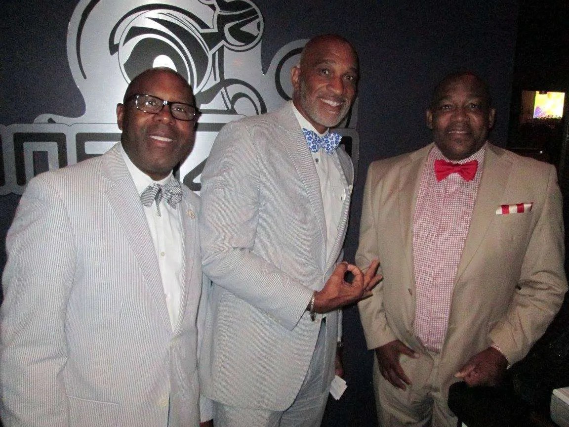 The Fundraising Committee at fundraising event. Brothers Derrick Thomas, Rodney Moody and John Coleman.