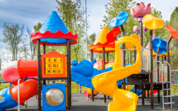 An empty playground with climbing structures, symbolizing the need for inclusive risky play for children with disabilities.