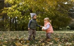 Young children practicing cooperative play and sharing during a nature-based activity