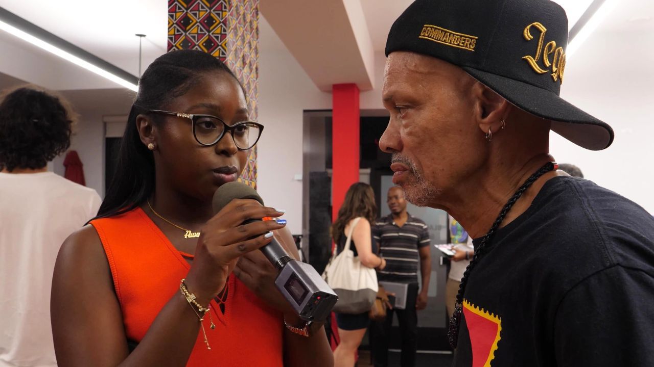Still image of TRNN's Mansa Musa (right) interviews Awaly Diallo (left), an organizer with the Malcolm X Grassroots Movement (MXGM), at a Black August 2025 event hosted by the Washington, DC, chapter of MXGM. Image by Cameron Granadino/TRNN.