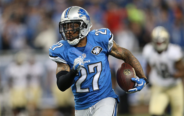 DETROIT, MI - OCTOBER 19: Glover Quin #27 of the Detroit Lions runs back the fourth quarter interception off Dree Brees (not in photo) during the game at Ford Field on October 19, 2014 in Detroit, Michigan. The Lions defeated the Saints 24-23. (Photo by Leon Halip/Getty Images)