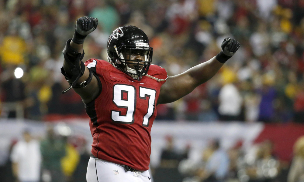 Oct 30, 2016; Atlanta, GA, USA; Atlanta Falcons defensive tackle Grady Jarrett (97) celebrates a failed fourth down conversion by Green Bay Packers quarterback Aaron Rodgers (not pictured) in the fourth quarter of their game at the Georgia Dome. The Falcons won 33-32. Mandatory Credit: Jason Getz-USA TODAY Sports