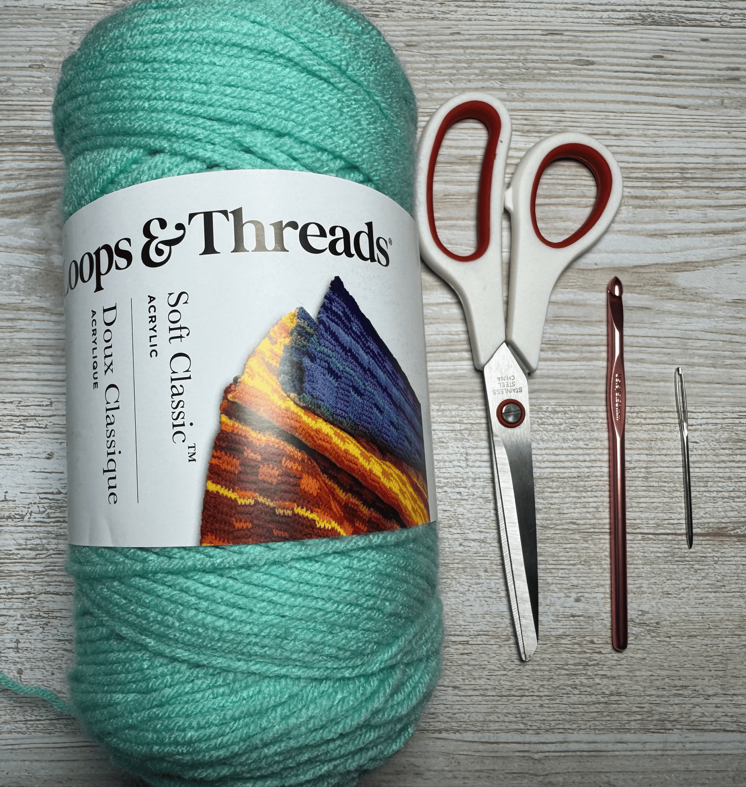 Materials needed for this crochet pattern are yarn, scissors, hook and darning needle
