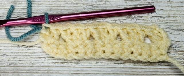 Granny Stripe stitch row 2, pull up second color at end of row.