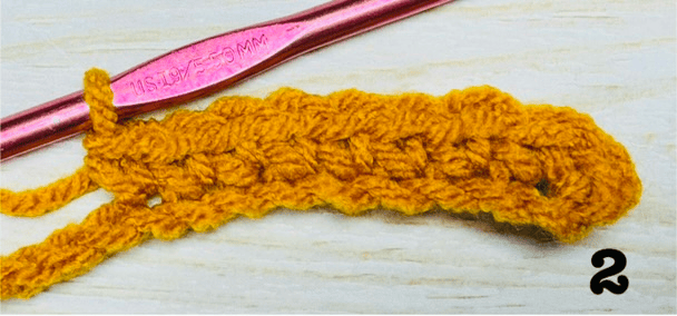 Step 2, row 1 of the Chevron stitch is 7 single crochets in the next 7 stitches.