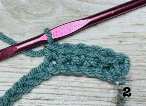 Step 2 of the close chevron stitch - single crochet in next 4 stitches.