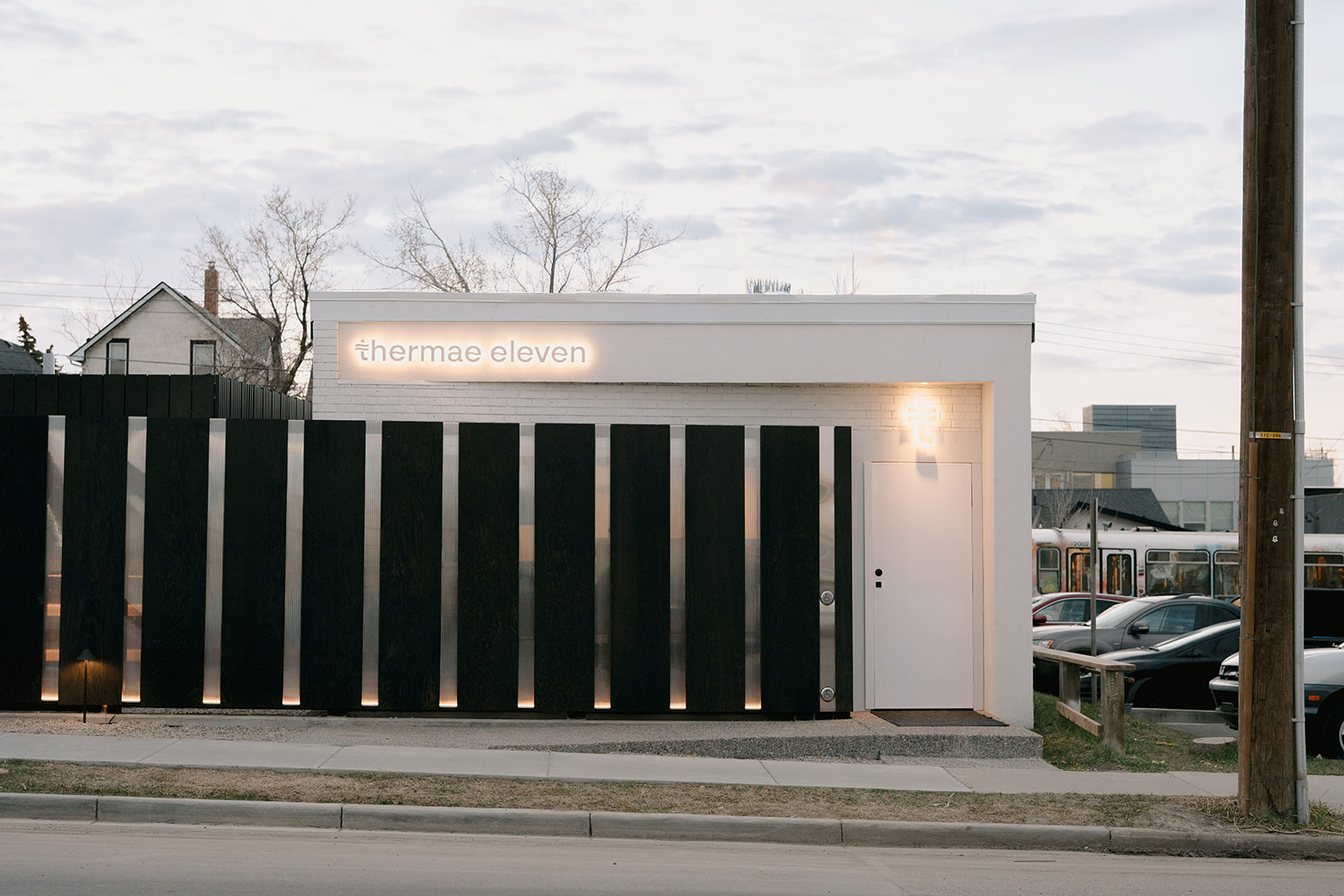 exterior street view of thermae eleven hydrotherapy spa at dawn