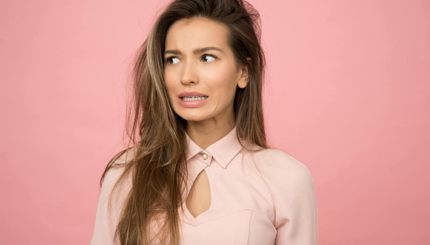 woman wearing pink top