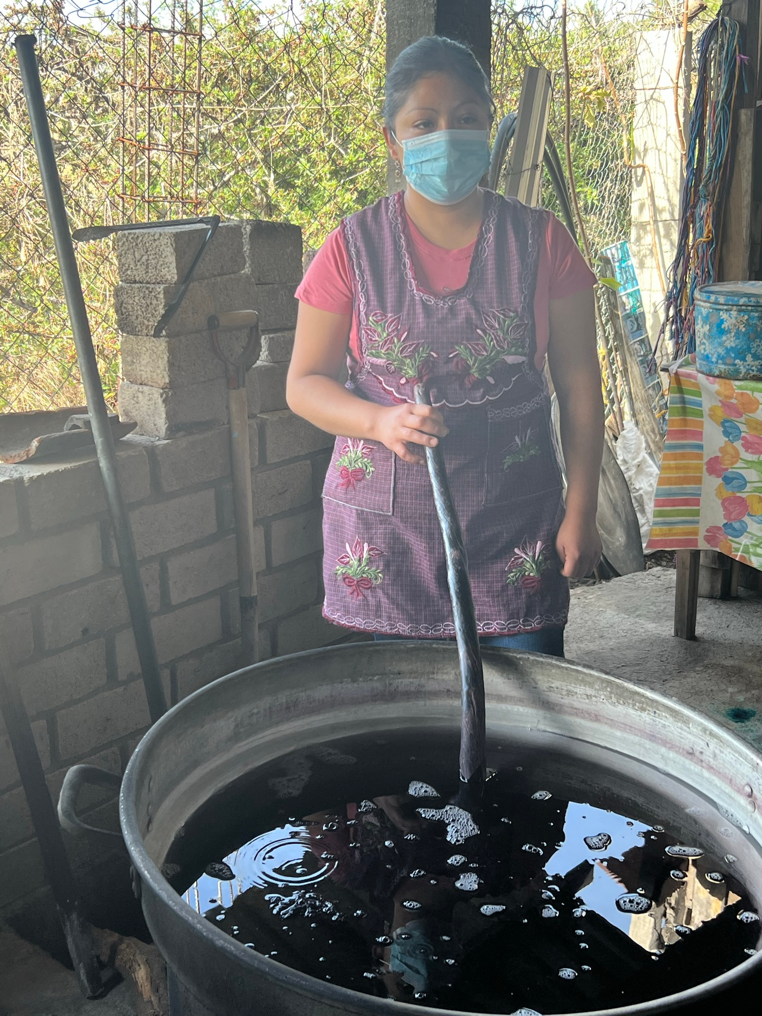 Yarn being boiled in dye