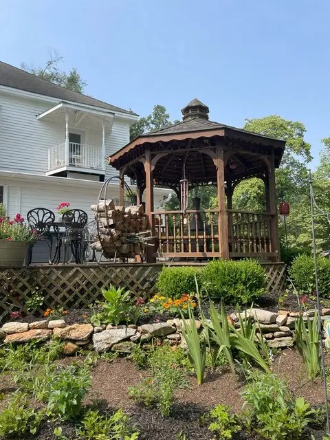 Enjoy the flowers by the gazebo