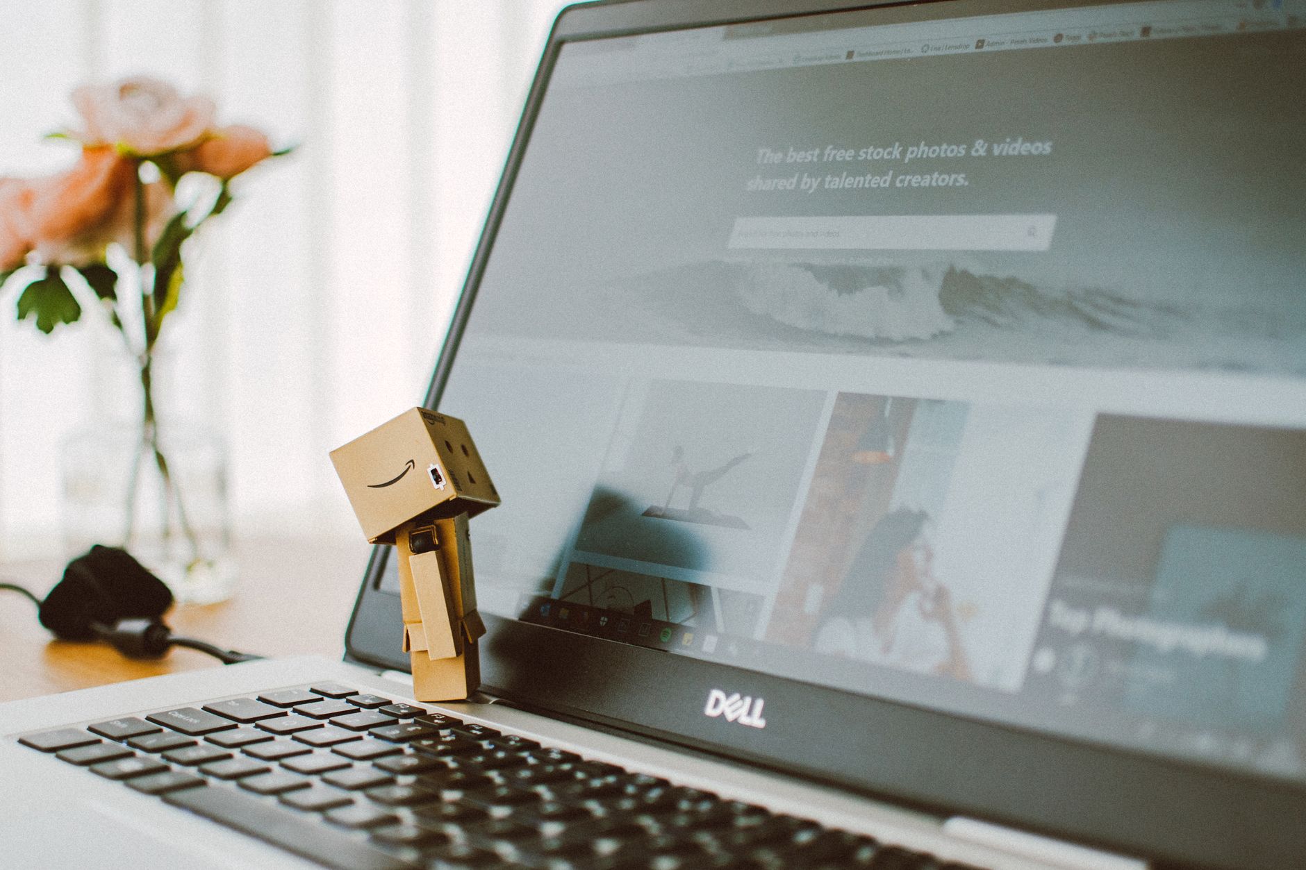 amazon box looking at black dell laptop