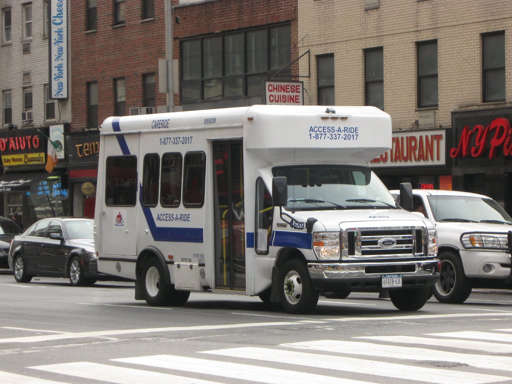 a paratransit van on a city street