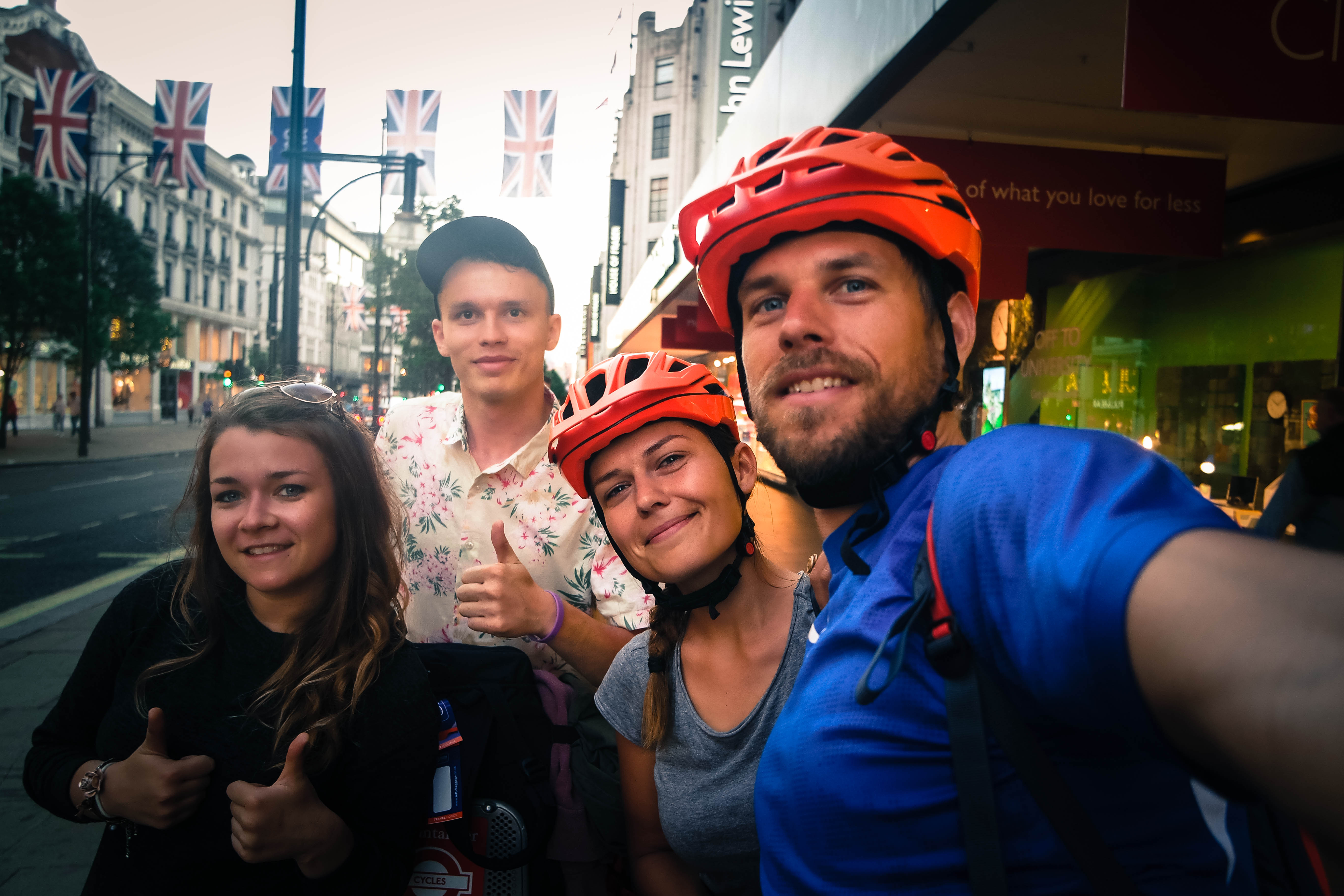 bicycle rider couple with two friends in the united kingdom
