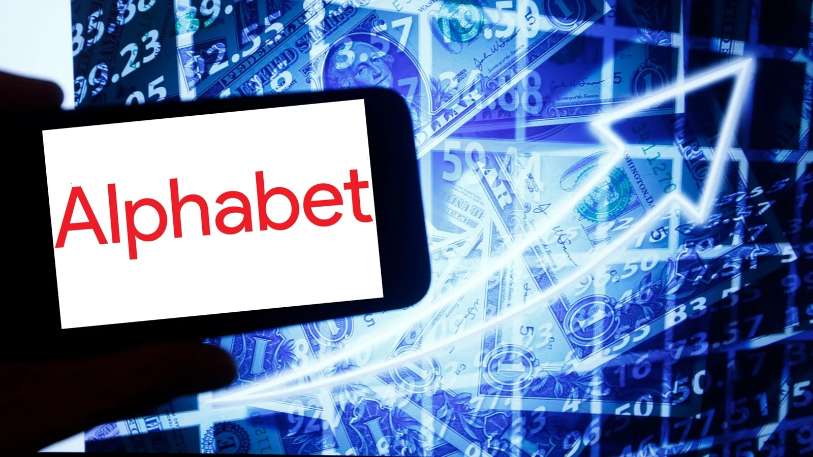 Alphabet logo displayed on a smartphone with US dollar bills and an upward financial chart, representing the company's AI infrastructure investment and future growth.