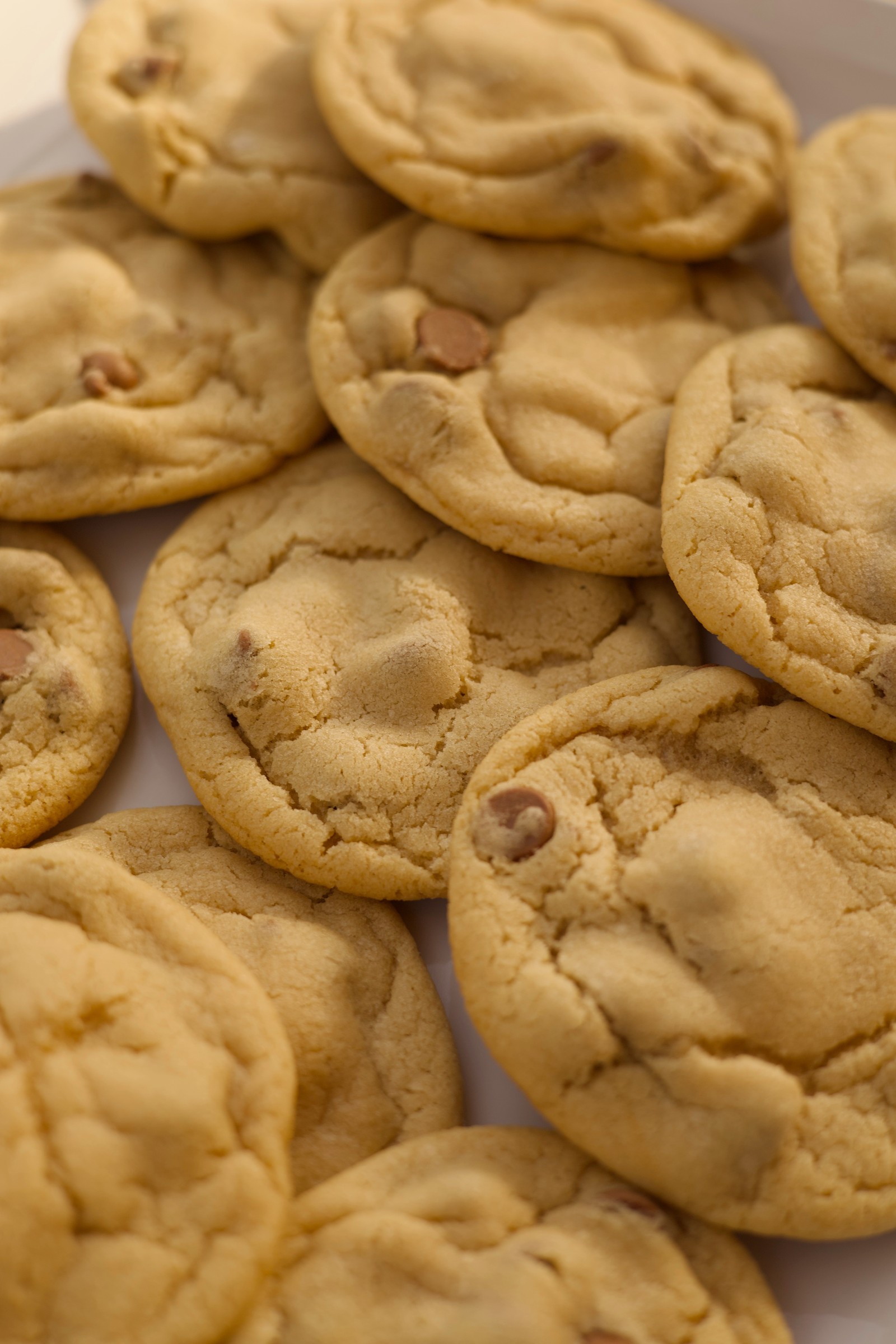 Mrs. Fields chocolate chip cookies on a white platter
