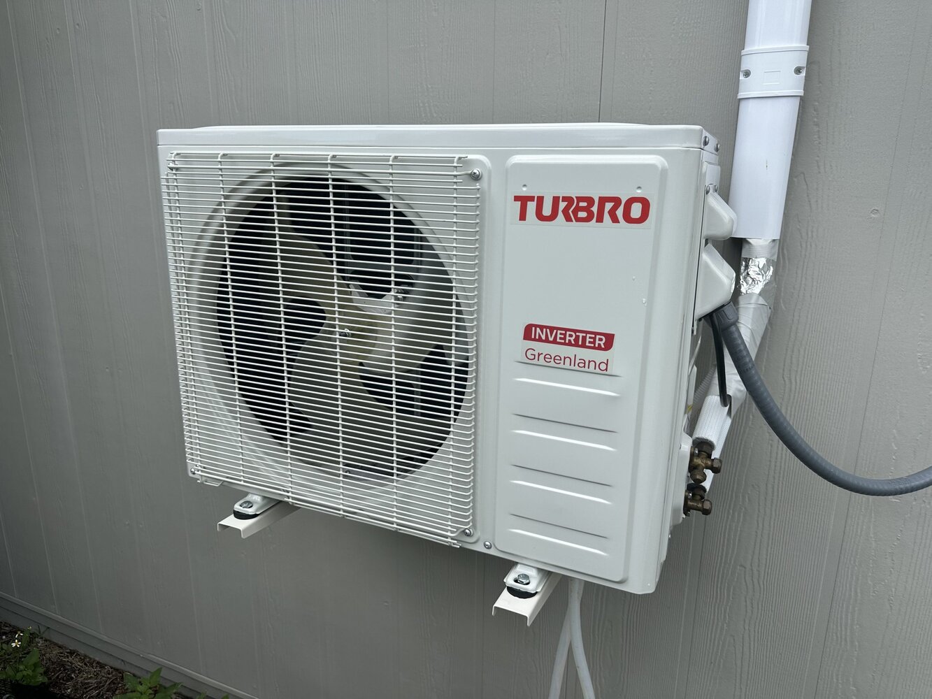 Turbro Greenland 12K mini split outdoor condenser mounted on a wall