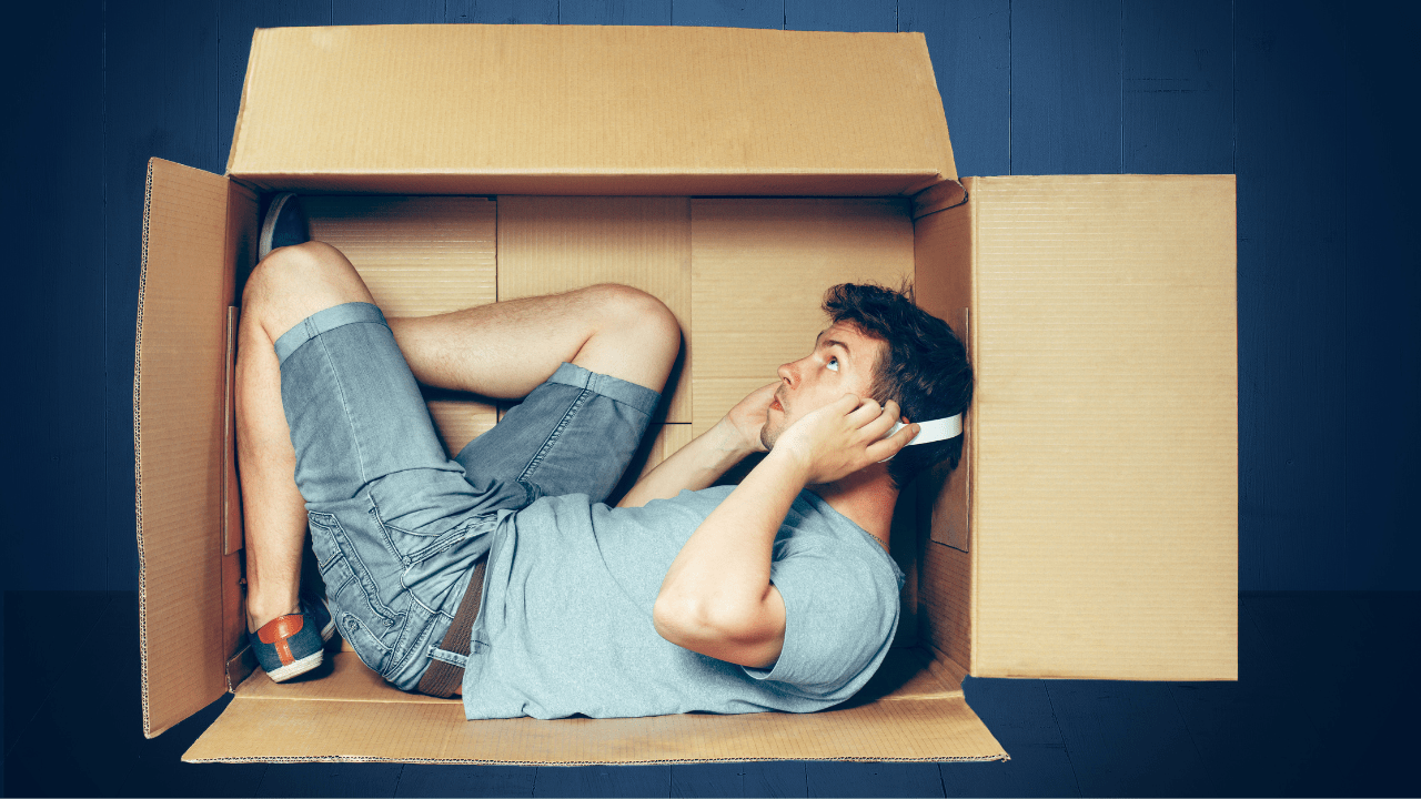 Introvert hiding in a box with earphones. | The Vibe With Ky