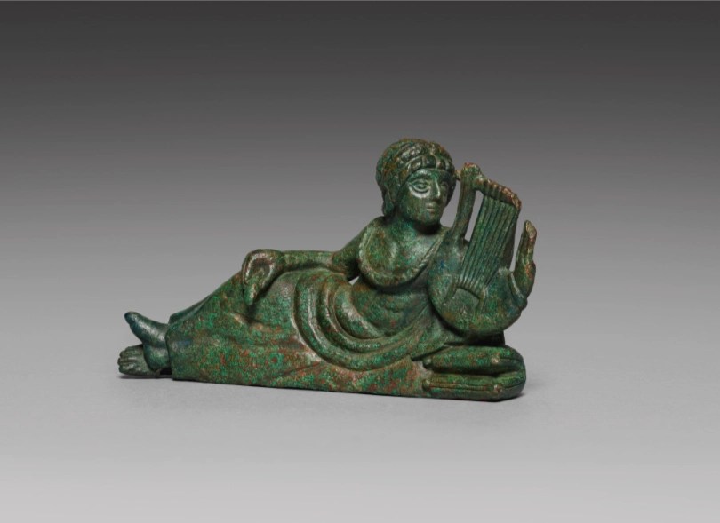 Greek vessel ornament of a lyre player, 400–375 BCE
