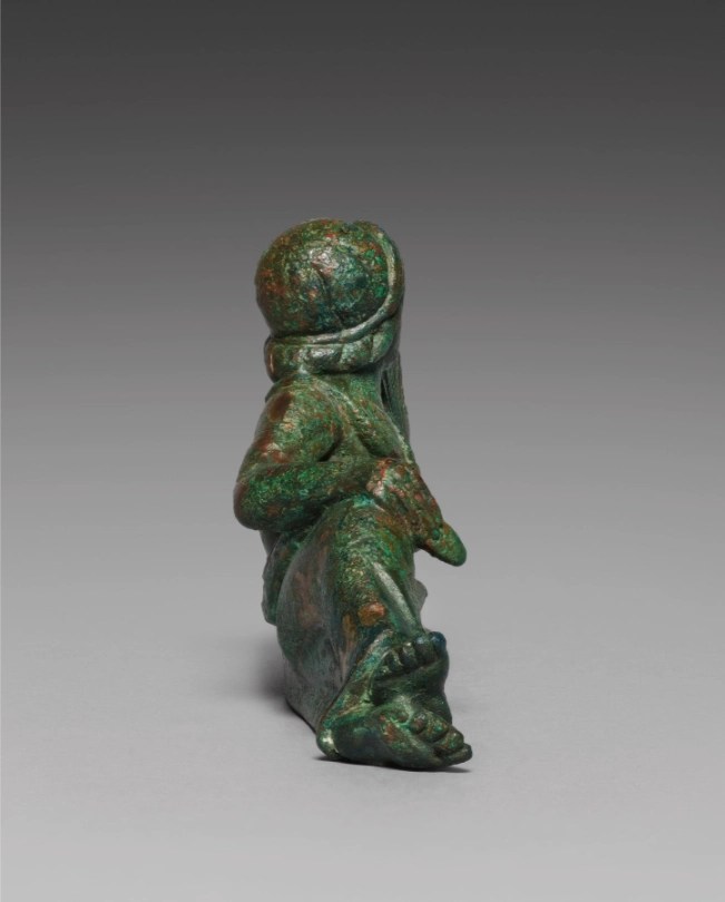 Vessel Ornament of Lyre Player, side view showing figure profile

