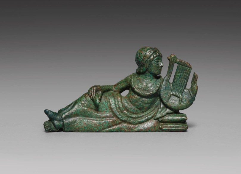 Greek vessel ornament of a lyre player, 400–375 BCE