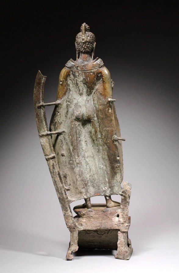 Kashmiri brass Buddha with silver inlays, c. 900 CE back view