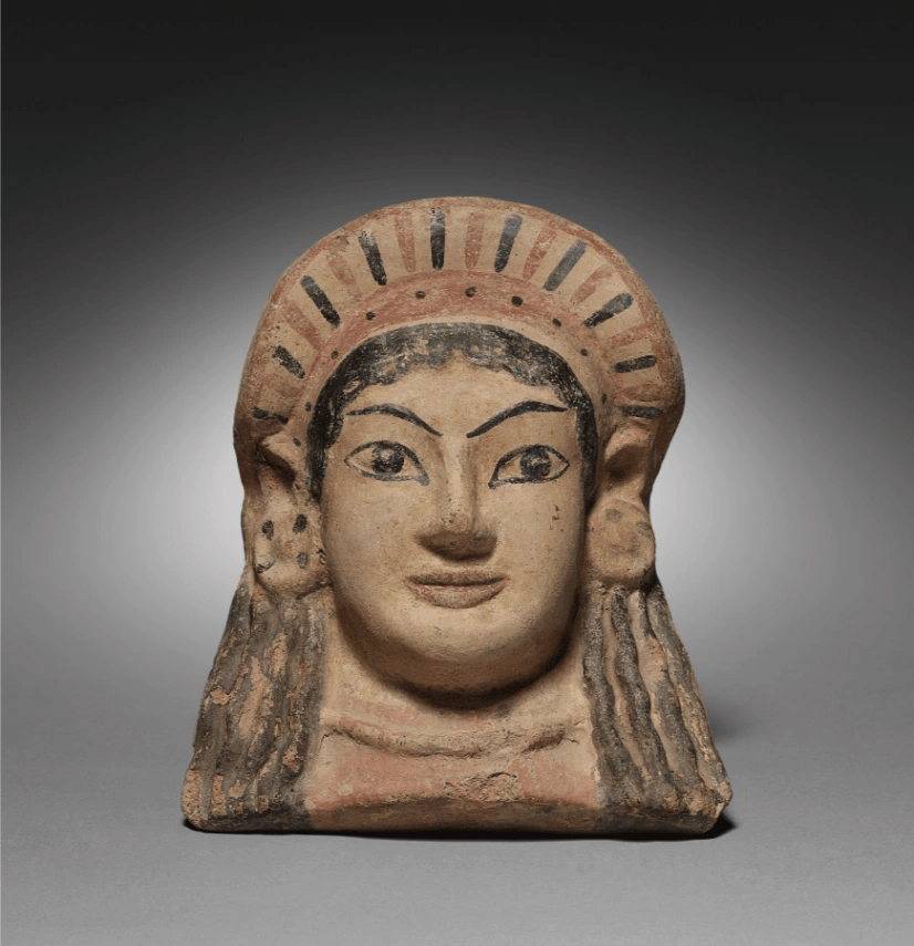 Etruscan terracotta antefix with a maiden’s face