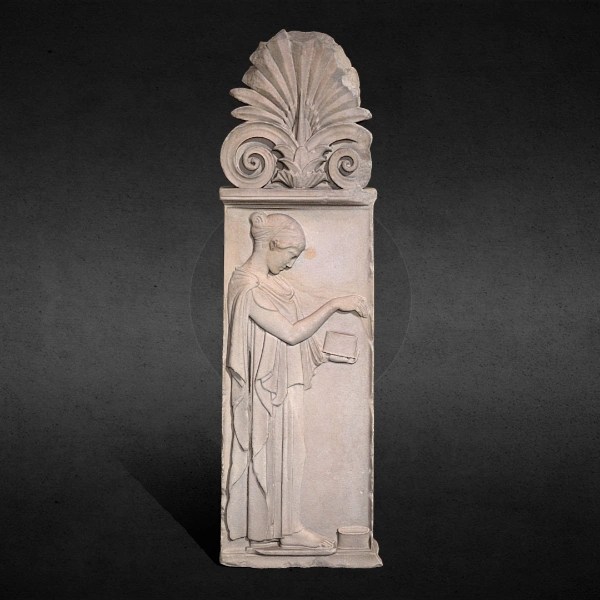 Relief sculpture of a robed woman holding a small open box with an object above a circular container, topped with a decorative acanthus motif