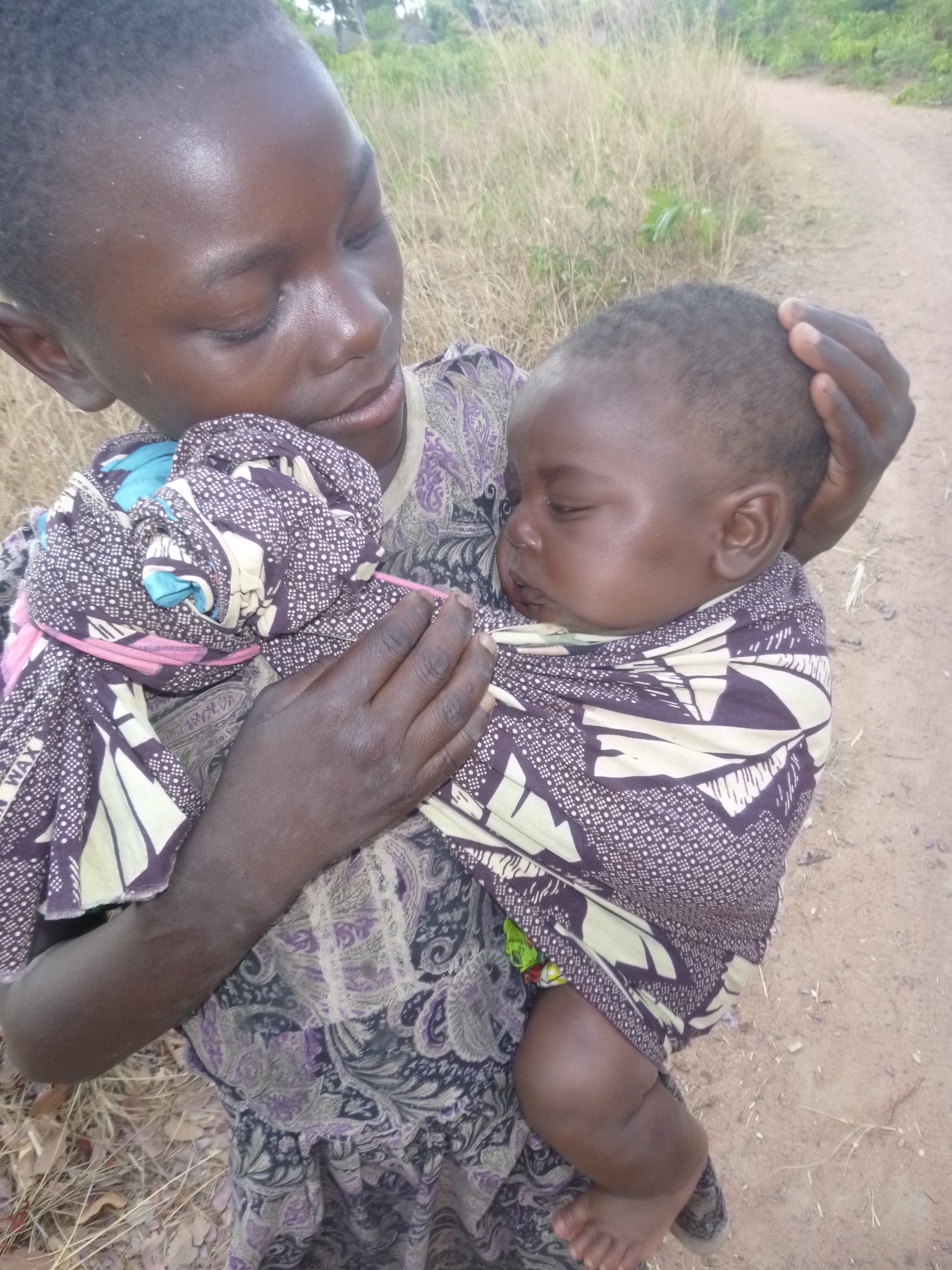 Loyci with her little sister, Muso.