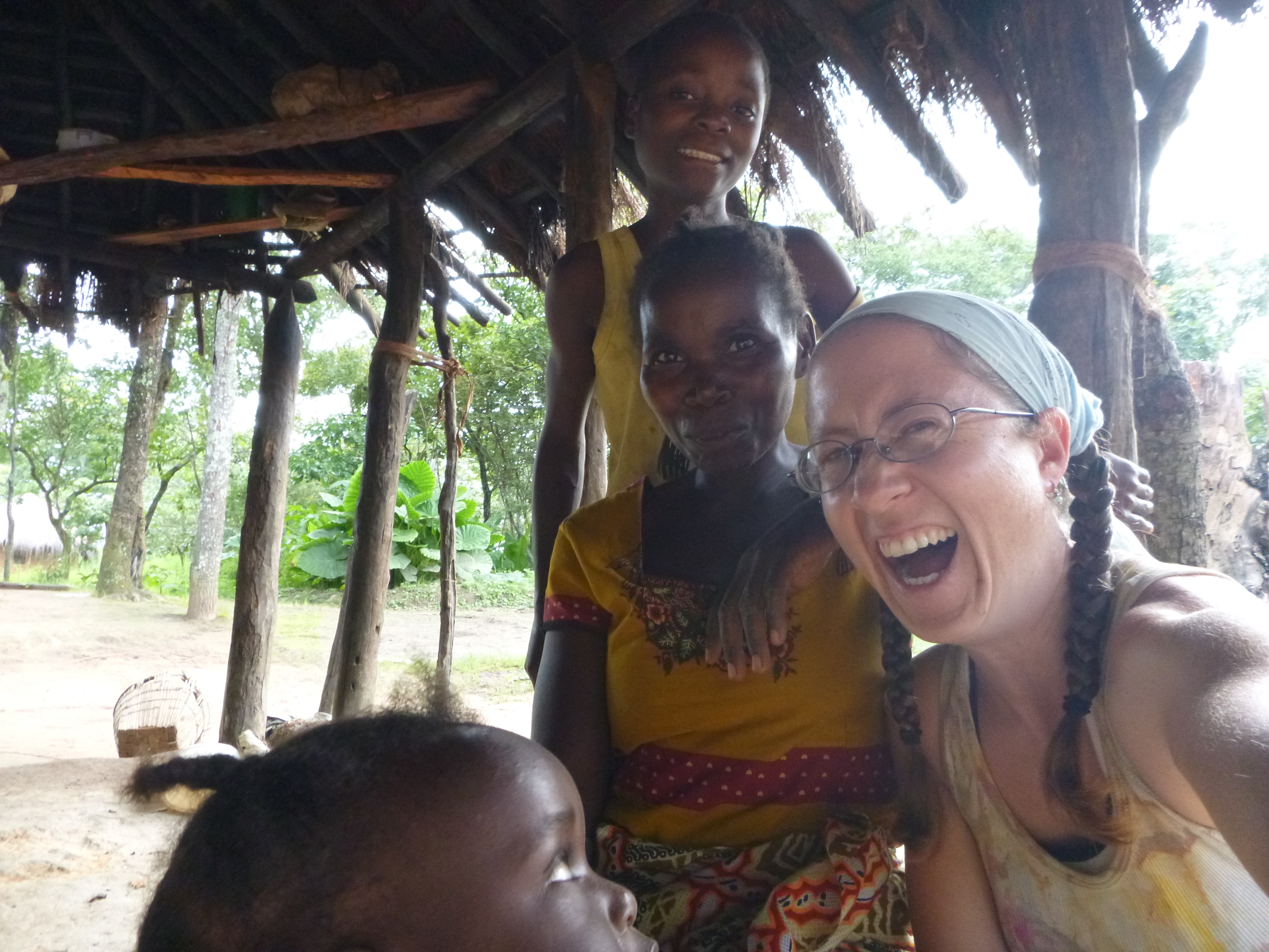 Hangin' out with some of my favorite people in Mfuba: Bwalya, Ba Agatha, and Gile (looking up from the corner).