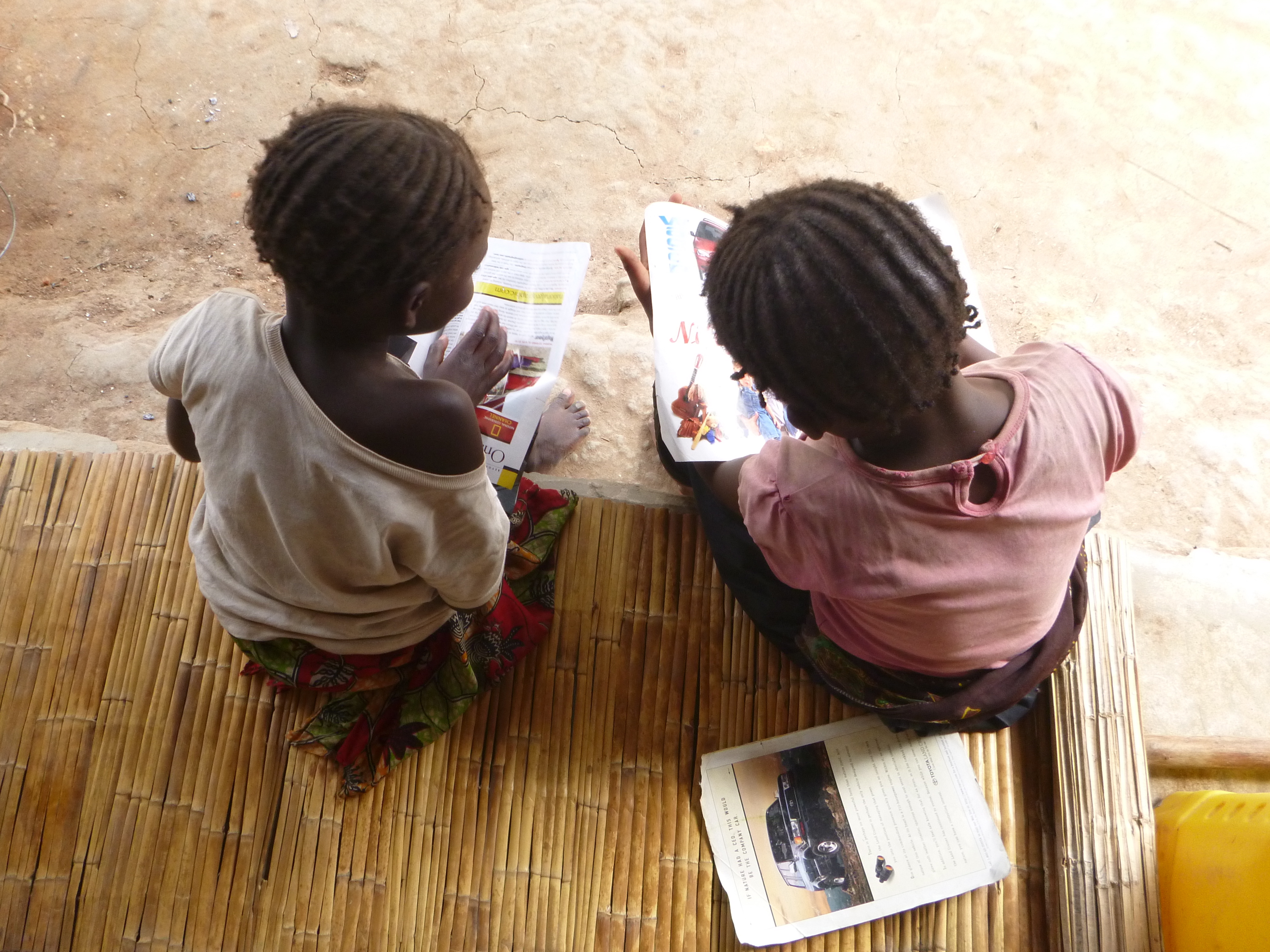 Donna and Doro "reading" on my front porch.