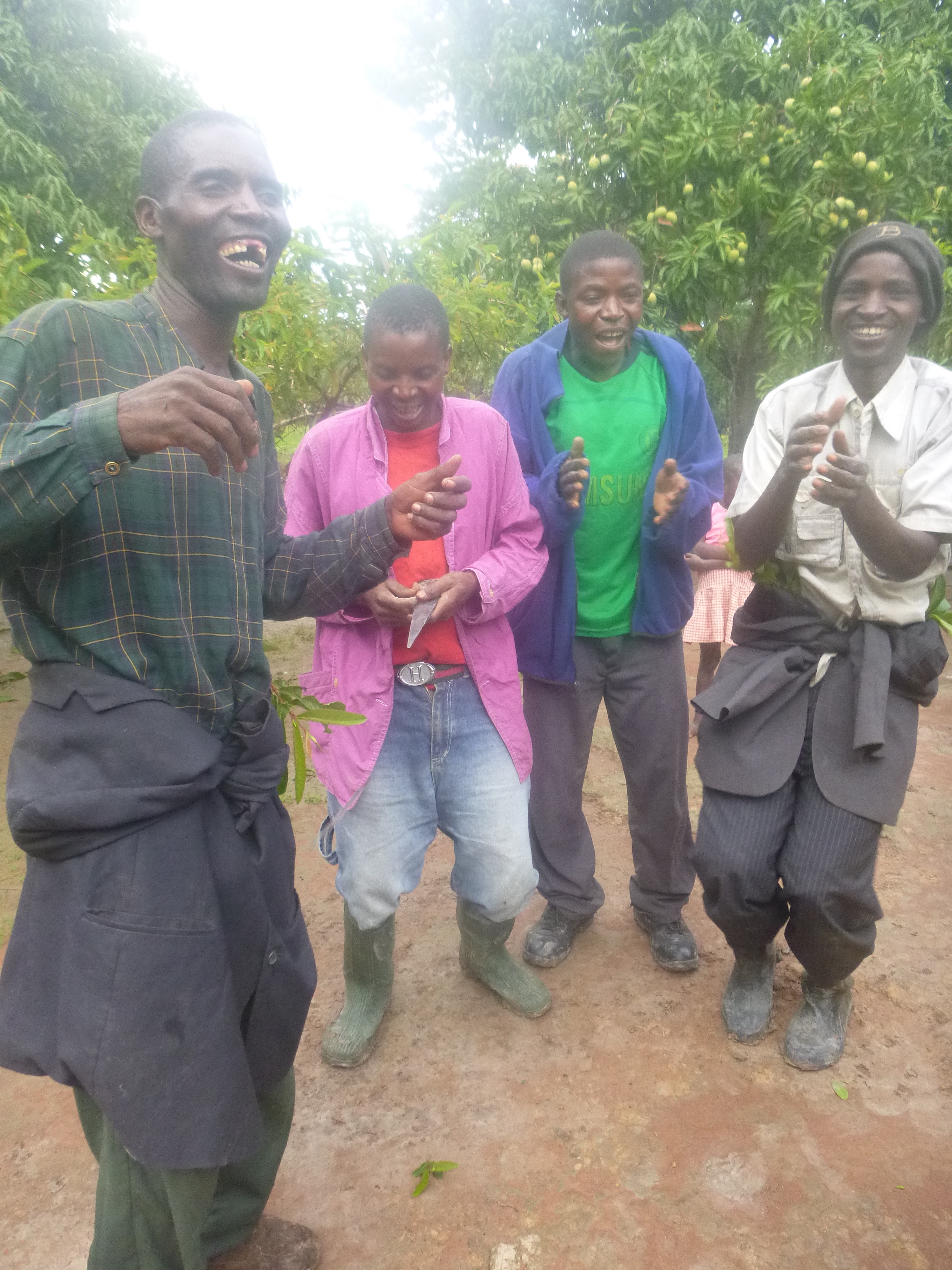 Ba Allan and the guys dancing the morning after Allan's eldest daughter's all-night wedding/"kitchen party."