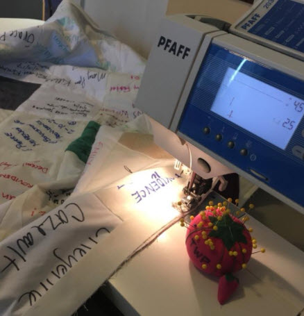 11a. The edging and the quilt are carefully joined, first with fabric glue and then with thread on the machine.
