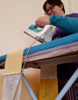 5. The rows of square are flipped over so that the seams between squares can be ironed open and flat. Rows remain numbered to preserve placement in the final design.