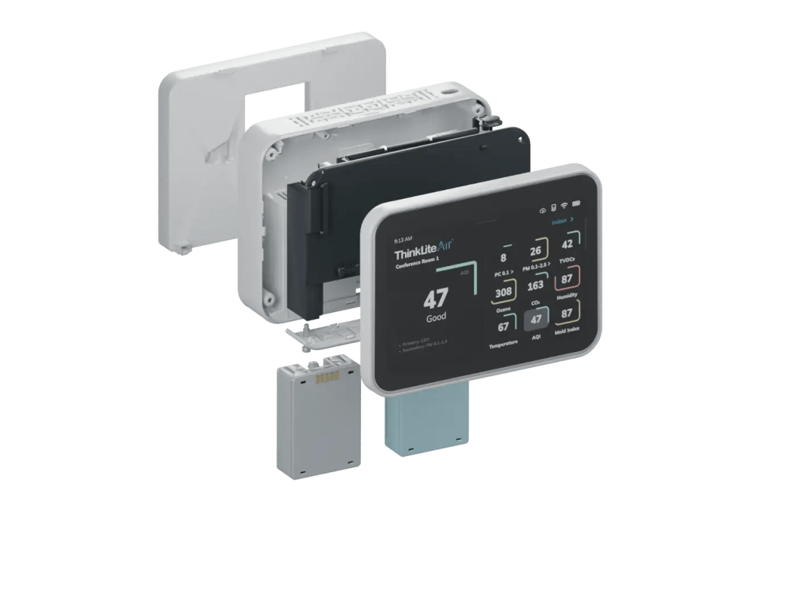 Exploded Flair indoor air quality monitor showing the display, enclosure, electronics, mounting plate and removable sensor capsules