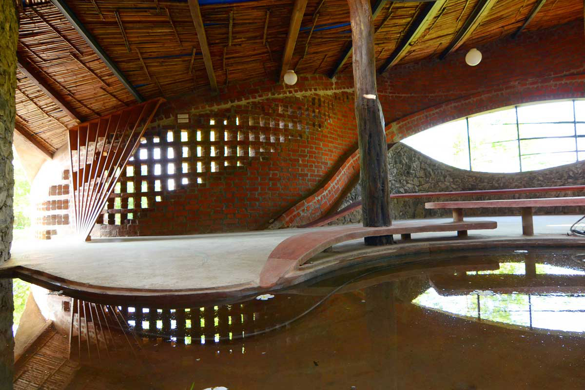 Reflections in the water-body central to the plan.